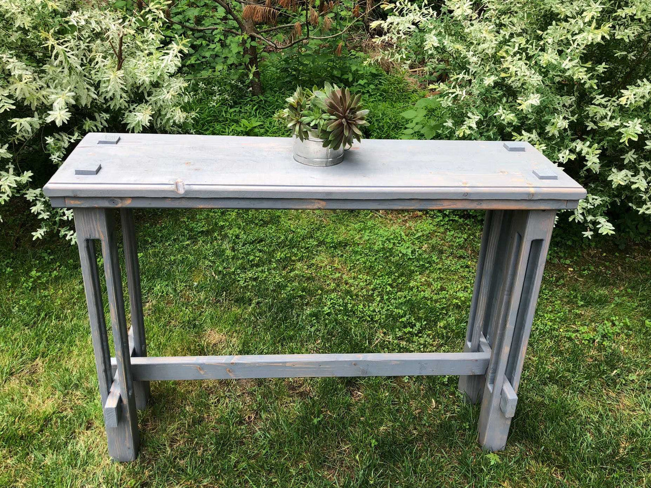 Thermally modified outdoor bistro table, assembled without hardware or tools. Ships flat.