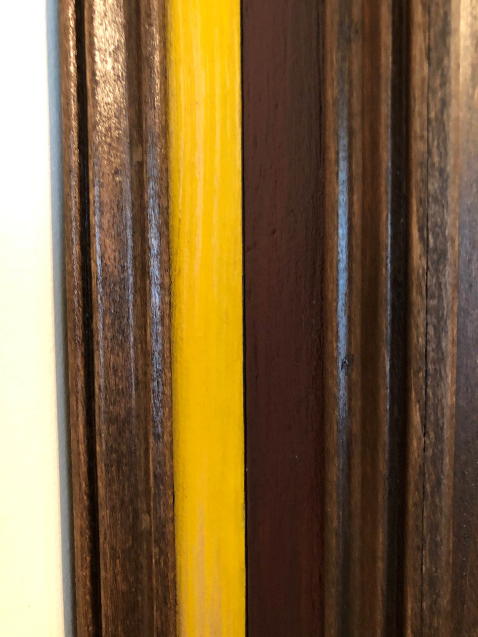 Close up shot of layered solid wood display case side